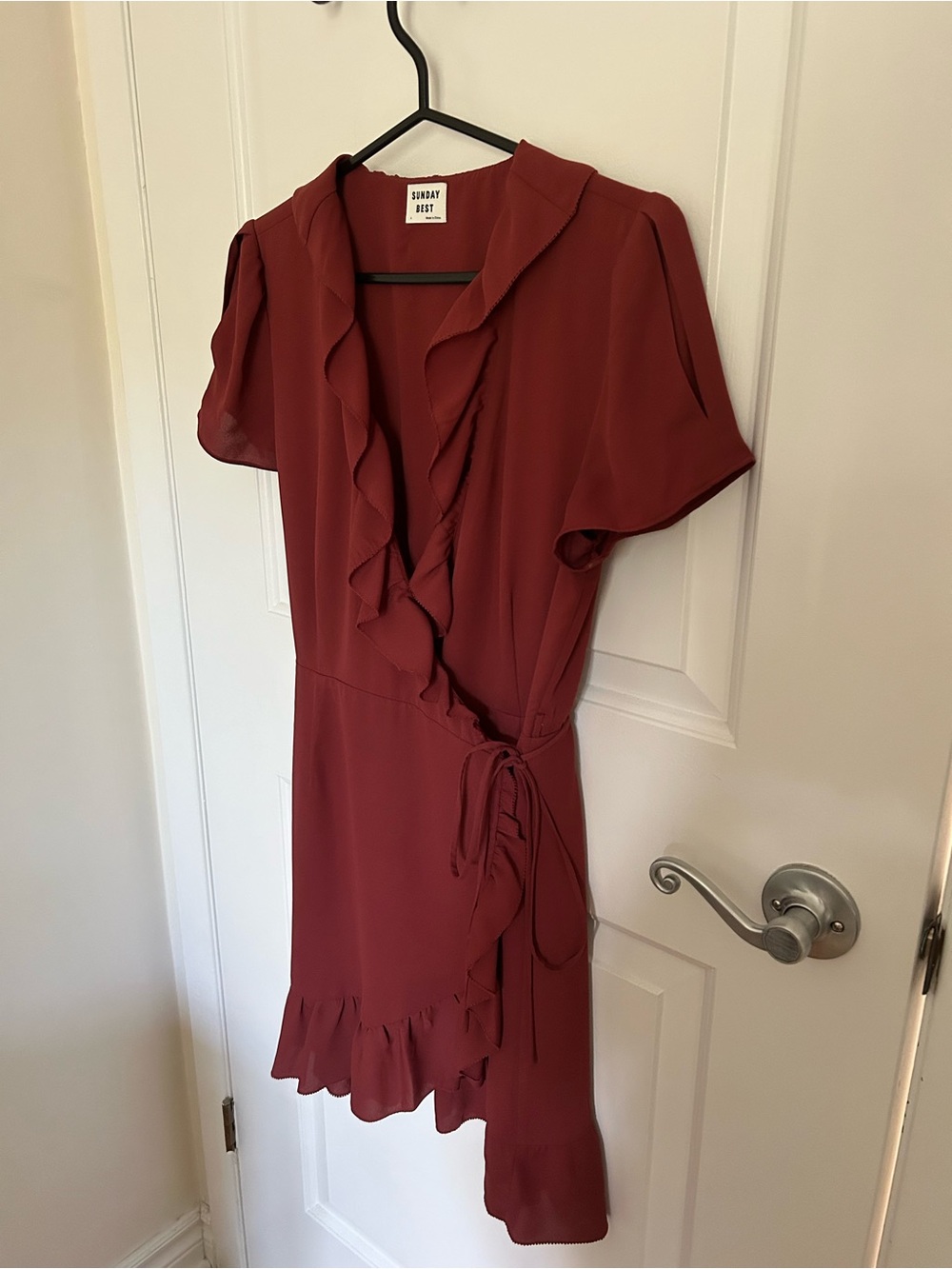 Aritzia rust-red wrap dress with ruffle details